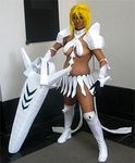  akuzetsunaomi armor arrancar bleach blonde_hair breasts cosplay espada hollow large_breasts lowres miniskirt photo resurreccion skirt sword tia_harribel tier_harribel tier_harribel_(cosplay) weapon 