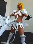  akuzetsunaomi armor arrancar bleach blonde_hair breasts cosplay espada hollow large_breasts lowres miniskirt photo resurreccion skirt sword tia_harribel tier_harribel tier_harribel_(cosplay) weapon 