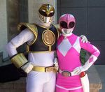  1boy 1girl cosplay gosei_sentai_dairanger kiba_ranger koryu_sentai_zyuranger kyoryu_sentai_zyuranger looking_at_viewer photo pink_ranger power_rangers sentai super_sentai white_ranger 