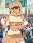  aetherion box breasts cardboard cardboard_box cardboard_box_gundam cleavage cowboy_shot crowd gundam highres large_breasts original photo_background solo_focus strapless tube_top 