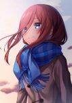  1girl absurdres bangs blue_eyes blue_scarf blurry blurry_background blush brown_coat brown_hair closed_mouth cloud coat commentary_request fringe_trim go-toubun_no_hanayome gradient_sky hair_between_eyes highres long_hair long_sleeves looking_ahead nakano_miku outdoors scarf sky slope_(check238) smile solo striped striped_scarf upper_body 