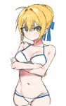  1girl ahoge arms_under_breasts artoria_pendragon_(fate) bangs bikini blonde_hair blue_ribbon blush breasts cleavage closed_mouth cropped_legs crossed_arms fate/grand_order fate/stay_night fate_(series) green_eyes hair_bun hair_ribbon looking_at_viewer medium_breasts pinch_(nesume) ribbon saber simple_background single_hair_bun solo swimsuit wet white_background white_bikini 