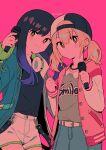 2girls artist_name azusawa_kohane bangs belt black_hair black_headwear black_shirt blonde_hair blue_jacket blue_shorts blush breasts brown_eyes buttons closed_mouth clothes_writing collared_shirt colored_skin gradient gradient_hair green_shirt hair_between_eyes hand_up hands_up hat heart heart_necklace highres holding holding_microphone jacket jewelry long_hair long_sleeves looking_at_viewer medium_breasts menma_(enaic31) microphone multicolored_hair multiple_girls necklace open_clothes open_jacket orange_eyes pink_background pink_jacket pink_skin pocket project_sekai puffy_long_sleeves puffy_sleeves purple_hair shiraishi_an shirt short_hair short_twintails shorts sidelocks simple_background smile standing t-shirt twintails two-tone_headwear watermark white_belt white_headwear white_shorts 
