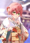  1girl absurdres ahoge bangs blurry blurry_background blush breasts cleavage finger_to_mouth green_eyes hair_between_eyes hair_ornament highres holding hololive japanese_clothes kimono komiya_latte looking_at_viewer obi print_kimono sakura_miko sash short_hair shushing smile solo translation_request upper_body virtual_youtuber 