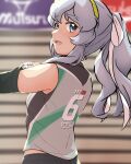  1girl absurdres alternate_hairstyle arthur_ko blue_eyes blurry blurry_background blush clothes_writing cowboy_shot green_hairband grey_hair hairband highres kantai_collection long_hair open_mouth ponytail smile solo sportswear unfinished upper_body volleyball_uniform wavy_hair yamagumo_(kancolle) 
