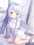  1girl absurdres alarm_clock animal_ear_fluff animal_ears bare_legs barefoot bed blue_hair cat_ears cat_girl cat_tail clock female_child highres light_blue_hair long_hair long_sleeves looking_at_viewer naked_shirt on_bed original oversized_clothes oversized_shirt partially_unbuttoned shirt sitting sleeves_past_wrists tail white_shirt yellow_eyes yokozuwari yuduki_pdx 