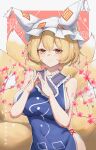  1girl absurdres animal_ears artist_name blonde_hair blush breasts closed_mouth fox_ears fox_tail hat highres huangyou large_breasts multiple_tails pillow_hat short_hair sideboob smile solo tabard tail touhou upper_body white_headwear yakumo_ran yellow_eyes 