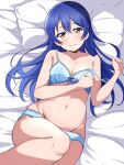  1girl blue_bra blue_hair blue_panties blush borgbutler bra breasts commentary embarrassed grabbing_own_breast highres long_hair looking_at_viewer love_live! love_live!_school_idol_project lying navel on_back on_bed panties small_breasts sonoda_umi underwear yellow_eyes 