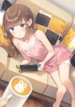  1girl barefoot blue_eyes blush brown_hair commentary_request couch cup cushion from_above handheld_game_console highres holding holding_cup holding_handheld_game_console knees_together_feet_apart latte_art long_hair looking_at_viewer lying nightgown nintendo_switch no_bra on_couch on_side open_mouth original pink_nightgown playing_games pov pov_hands ruien_(wu_jui-en) solo_focus wooden_floor 