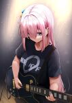  1girl bangs black_shirt bocchi_the_rock! breasts clothes_writing collarbone commentary_request cube_hair_ornament electric_guitar gotou_hitori guitar hair_between_eyes hair_ornament holding holding_instrument instrument long_hair medium_breasts minato_yu one_side_up pink_hair shirt short_sleeves solo very_long_hair wooden_floor 