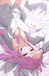  1girl angel_wings blue_archive breasts cleavage feathered_wings halo highres long_sleeves looking_at_viewer low_wings lying mika_(blue_archive) nenight on_back on_bed pink_hair pink_halo shirt solo upside-down white_shirt wings yellow_eyes 