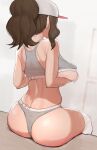  1girl alternate_breast_size ass bare_shoulders baseball_cap bra breast_lift breasts brown_hair facing_away gatchan grey_bra grey_panties hair_through_headwear hat highres hilda_(pokemon) large_breasts panties pokemon pokemon_(game) pokemon_bw ponytail sitting solo sweat thighhighs thighs underwear white_thighhighs 