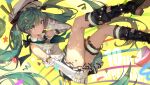  1girl absurdres anniversary boots bridal_garter commentary_request detached_sleeves floating_hair green_eyes green_hair hat hatsune_miku highres linfi-muu long_hair looking_at_viewer revision skirt solo spring_onion star_(symbol) twintails very_long_hair vocaloid yellow_background 