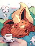  blush closed_eyes commentary couch cup fang flareon hanabusaoekaki highres no_humans on_couch open_mouth pillow pokemon pokemon_(creature) saucer solo spoon tea teacup 
