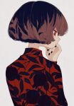  1girl black_nails bob_cut brown_hair closed_mouth fingernails floral_print from_behind highres ka_(marukogedago) long_sleeves mole mole_on_neck mole_under_mouth nail_polish nape original red_eyes red_shirt shirt short_hair simple_background solo white_background 
