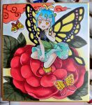  1girl antennae bangs bare_legs barefoot blue_hair bug butterfly butterfly_wings dress eternity_larva fairy flower green_dress kneeling leaf leaf_on_head multicolored_clothes multicolored_dress proton red_flower short_hair short_sleeves solo touhou wings yellow_eyes yellow_wings 