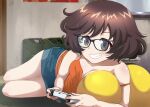  1girl akiyama_yukari breasts brown_hair controller denim denim_shorts game_controller girls_und_panzer glasses highres holding holding_controller holding_game_controller jerry_can lying on_side orange_tank_top playing_games playstation_controller shiina_excel shorts sleeveless smile solo tank_top thighs 