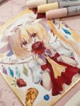  1girl apple art_tools_in_frame ascot blonde_hair collared_shirt commentary crystal crystal_wings flandre_scarlet food frilled_wrist_cuffs frills fruit hat hat_ribbon highres holding holding_food holding_fruit looking_at_viewer midriff mob_cap multicolored_wings navel neruko_(piano00324) photo_(medium) puffy_short_sleeves puffy_sleeves red_eyes red_vest red_wrist_cuffs ribbon shikishi shirt short_sleeves solo strawberry touhou traditional_media vest white_hat white_shirt wings wrist_cuffs yellow_ascot 