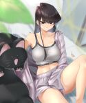  1girl bangs bare_shoulders black_eyes black_hair blush breasts clothed_masturbation highres jacket keychain komi-san_wa_komyushou_desu komi_shouko long_hair looking_at_viewer masturbation mitsugu navel off_shoulder parted_lips shorts sitting solo sports_bra stuffed_animal stuffed_cat stuffed_toy 