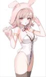  1girl :o animal_ears animal_hood bare_shoulders black_leotard breasts brown_hair cleavage danganronpa_(series) danganronpa_2:_goodbye_despair detached_collar fake_animal_ears hair_ornament hands_up highres hood large_breasts leotard looking_at_viewer medium_hair multicolored_leotard myusi_(gdg1470361) nanami_chiaki neck_ribbon pink_eyes pink_ribbon playboy_bunny rabbit_ears rabbit_hood ribbon solo strapless strapless_leotard two-tone_leotard wrist_cuffs 