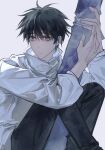  1boy black_hair black_pants closed_mouth commentary_request highres holding jujutsu_kaisen jujutsu_tech_uniform loveiswhim okkotsu_yuta pants short_hair solo white_background 
