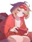  1girl ahoge alternate_breast_size_(larger) alternate_costume animal_ears blonde_hair blue_eyes breasts cleavage closed_mouth colored_inner_hair commentary controller flying_sweatdrops game_controller goat_ears goat_girl hair_intakes holding holding_controller holding_game_controller hololive indoors large_breasts mask mask_on_head multicolored_hair pajamas red_hair red_pajamas red_streaks shirt short_hair shusuchii sitting sleep_mask solo streaked_hair suzuna_tsuzuri transparent_background virtual_youtuber white_shirt 