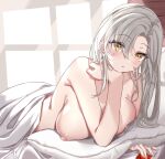 azur_lane bangs bare_shoulders bed bedroom blush breasts condom condom_wrapper drake_(azur_lane) grey_hair highres large_breasts looking_at_viewer lying morning nipples nude on_bed on_stomach pillow under_covers vayneeeee yellow_eyes 
