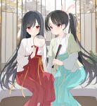  2girls absurdres bangs black_hair blue_hakama chinese_zodiac closed_mouth feet_out_of_frame folded_fan folding_fan hakama hakama_skirt hand_fan highres holding holding_fan japanese_clothes jyt kimono long_sleeves looking_at_viewer magnifying_glass multiple_girls original ponytail red_eyes red_hakama skirt white_kimono wide_sleeves year_of_the_rabbit 