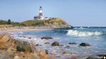  artist_logo blue_sky building day flag flagpole highres lighthouse no_humans ocean original outdoors rural scenery sky water waves yucong_tang 