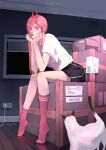  1girl absurdres artist_name box cardboard_box chainsaw_man commentary cross-shaped_pupils dolphin_shorts hair_between_eyes head_rest highres horns iruia5 long_hair looking_at_viewer meowy_(chainsaw_man) pink_hair pink_socks power_(chainsaw_man) red_eyes red_horns shirt shorts sitting socks symbol-only_commentary symbol-shaped_pupils white_shirt 
