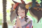  1girl absurdres animal_ears blurry blurry_background blurry_foreground closed_eyes day fang floral_print flower hair_flower hair_ornament hairband hatsumoude highres horse_ears inuyamatarou japanese_clothes kimono long_hair marvelous_sunday_(umamusume) new_year open_mouth outdoors palms_together praying purple_kimono ringlets skin_fang smile solo textless_version twintails umamusume upper_body 