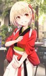  1girl apron bangs blonde_hair blurry blurry_background clenched_hands clenched_teeth hair_ribbon highres japanese_clothes kimono looking_to_the_side lycoris_recoil nishikigi_chisato one_side_up orange_eyes red_kimono red_ribbon rei_k_79 ribbon short_hair smile solo teeth waist_apron 