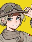  1girl blonde_hair blue_eyes flag goggles goggles_on_headwear helmet jewelry kaiserreich military military_uniform patch pzkpfwi ring short_hair teeth uniform upper_body yellow_background 