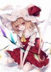  1girl ascot blonde_hair commentary dress flandre_scarlet hat highres kurumi_mashiro long_hair looking_at_viewer mob_cap no_pupils open_mouth puffy_short_sleeves puffy_sleeves red_dress red_eyes short_sleeves side_ponytail sitting solo touhou wariza white_headwear wings yellow_ascot 