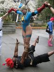  2boys 2girls bangs blonde_hair cammy_white cammy_white_(cosplay) capcom cosplay gouki gouki_(cosplay) ikuy kumatora kumatora_(cosplay) leotard long_hair mother_(game) mother_3 multiple_boys multiple_girls outdoors photo real ryuu_(street_fighter) ryuu_(street_fighter)_(cosplay) sakuracon street_fighter thong_leotard twin_braids 