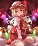  1girl absurdres ascot blonde_hair blush crystal fang flandre_scarlet glowing gumi_(fwjn7284) hat highres indoors looking_at_viewer mob_cap nose_blush pointy_ears puffy_sleeves red_eyes short_sleeves sitting skin_fang skirt smile solo touhou vest wariza wings 