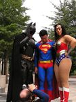  bat_(symbol) batman batman_(cosplay) batman_(series) bruce_wayne camera cosplay dc_comics justice_league lowres photo s_shield star star_print superman superman_(cosplay) superman_(series) tree trio wonder_woman wonder_woman_(cosplay) wonder_woman_(series) 