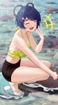  1girl ^_^ absurdres bare_arms bare_shoulders bikini black_shorts blue_hair closed_eyes commentary genshin_impact haerge hair_rings hand_up highres open_mouth rock sandals short_shorts shorts solo squatting swimsuit thighs water xiangling_(genshin_impact) yellow_bikini 