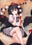  1girl :/ bangs black_bow black_bowtie black_feathers black_hair black_wings blush bow bowtie breasts crossed_legs feathered_wings feathers feet_out_of_frame fingernails hand_up hat holding holding_notebook holding_pen medium_breasts medium_hair neko_bocchi notebook pen pom_pom_(clothes) puffy_short_sleeves puffy_sleeves red_eyes shameimaru_aya shirt short_sleeves simple_background sitting solo tokin_hat touhou white_shirt wing_collar wings 