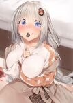  1girl a.i._voice arm_between_breasts between_breasts blue_eyes blurry blurry_background blush breasts brown_skirt candy chocolate chocolate_on_face collarbone commentary_request depth_of_field food food_in_mouth food_on_face grey_hair hair_ornament heart heart-shaped_chocolate highres indoors kanzen_bouon kizuna_akari kizuna_akari_(a.i._voice) large_breasts long_hair long_sleeves looking_at_viewer mouth_hold puffy_long_sleeves puffy_sleeves shirt skirt solo suspender_skirt suspenders very_long_hair voiceroid white_shirt 