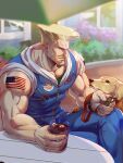  1boy american_flag_tattoo bara blonde_hair cup denim dog facial_hair feet_out_of_frame goatee guile highres holding holding_cup hood hood_down jewelry large_pectorals male_focus muscular muscular_male necklace official_alternate_costume pectoral_cleavage pectorals short_hair smile solo street_fighter street_fighter_6 tied_sleeves yuiofire zipper 