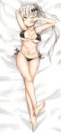  1girl absurdres bad_feet barefoot bikini black_bikini breasts cheosnuni dakimakura error eyebrows_visible_through_hair five-seven_(girls_frontline) girls_frontline hair_ornament highres large_breasts long_hair looking_at_viewer lying on_back one_eye_closed ponytail side-tie_bikini silver_hair solo swimsuit very_long_hair yellow_eyes 