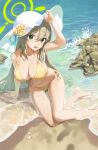  1girl :d absurdres arm_support arm_up bangs bare_legs barefoot beach bikini blue_archive blush breasts brown_hair chobbb cleavage day green_eyes halo hand_on_headwear hat highres large_breasts long_hair looking_at_viewer nonomi_(blue_archive) nonomi_(swimsuit)_(blue_archive) ocean open_mouth outdoors rock seashell shell side-tie_bikini_bottom sitting smile solo sun_hat swimsuit thigh_gap very_long_hair water white_headwear yellow_bikini yokozuwari 