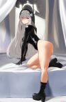  1girl ass bed black_footwear black_leotard blue_archive boots from_side full_body grey_hair hair_between_eyes halo high_heel_boots high_heels highres kion-kun leotard long_hair looking_at_viewer looking_to_the_side nun on_bed parted_lips red_eyes sakurako_(blue_archive) solo teeth very_long_hair 