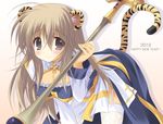  2010 animal_ears archbishop bad_id bad_pixiv_id blush cross emily_(pure_dream) garter_straps long_hair new_year ragnarok_online smile solo tail thighhighs tiger_ears tiger_tail 