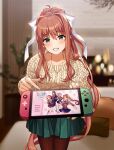  1girl alternate_costume aran_sweater black_pantyhose blurry blurry_background blush bow brown_hair cable_knit collarbone commentary couch cowboy_shot doki_doki_literature_club english_commentary green_eyes green_skirt hair_between_eyes hair_bow handheld_game_console holding holding_handheld_game_console indoors jewelry long_hair long_sleeves looking_at_viewer lucidsky meta miniskirt monika_(doki_doki_literature_club) necklace nintendo_switch pantyhose parted_lips pillow pleated_skirt pointing ponytail second-party_source sidelocks skirt smile solo standing sweater very_long_hair white_bow yellow_sweater 