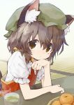  1girl animal_ear_fluff animal_ears bangs brown_eyes brown_hair cat_ears chen closed_mouth cup dress food fruit green_headwear green_tea hair_between_eyes hat mandarin_orange mob_cap nekoguruma red_dress shirt short_hair short_sleeves solo tatami tea touhou white_shirt 