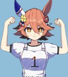  +_+ 1girl animal_ears arms_up bangs blue_background blush breasts closed_mouth clover_hair_ornament daruma_doll flexing hair_between_eyes hair_ornament horse_ears looking_at_viewer matikanefukukitaru_(umamusume) medium_breasts orange_eyes orange_hair race_bib shirt short_sleeves simple_background smile solo sudzume umamusume upper_body white_shirt 