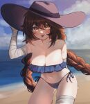  1girl absurdres arm_behind_back bandaged_arm bandaged_leg bandages bare_shoulders beach bikini blue_bikini blurry blurry_background blush braid breasts brown_hair cleavage collarbone frilled_bikini frills hair_between_eyes hanging_breasts hat highres holding holding_clothes holding_hat large_breasts leaning_forward long_hair looking_at_viewer navel ocean original side-tie_bikini_bottom sky sky_above_me solo strapless swimsuit tongue tongue_out tube_top twin_braids very_long_hair yellow_eyes 