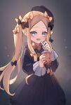  1girl abigail_williams_(fate) black_bow black_dress black_gloves black_headwear blonde_hair blue_eyes blush bow breasts bubble_tea cup disposable_cup dress drinking_straw fate/grand_order fate_(series) forehead gloves hair_bow hat highres long_hair long_sleeves looking_at_viewer miya_(miyaruta) open_mouth orange_bow parted_bangs sidelocks small_breasts smile solo twintails 